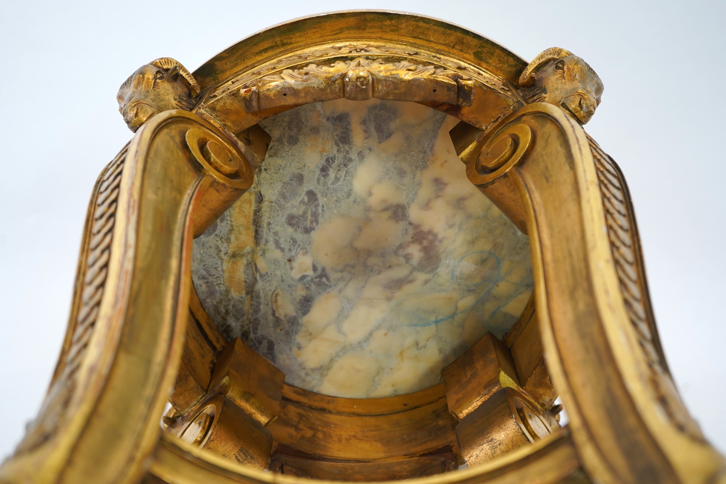 A late 19th century French circular carved giltwood and composition vase stand